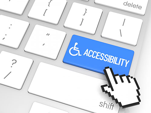 computer keyboard with a drawing of a hand pressing a blue accessibility key